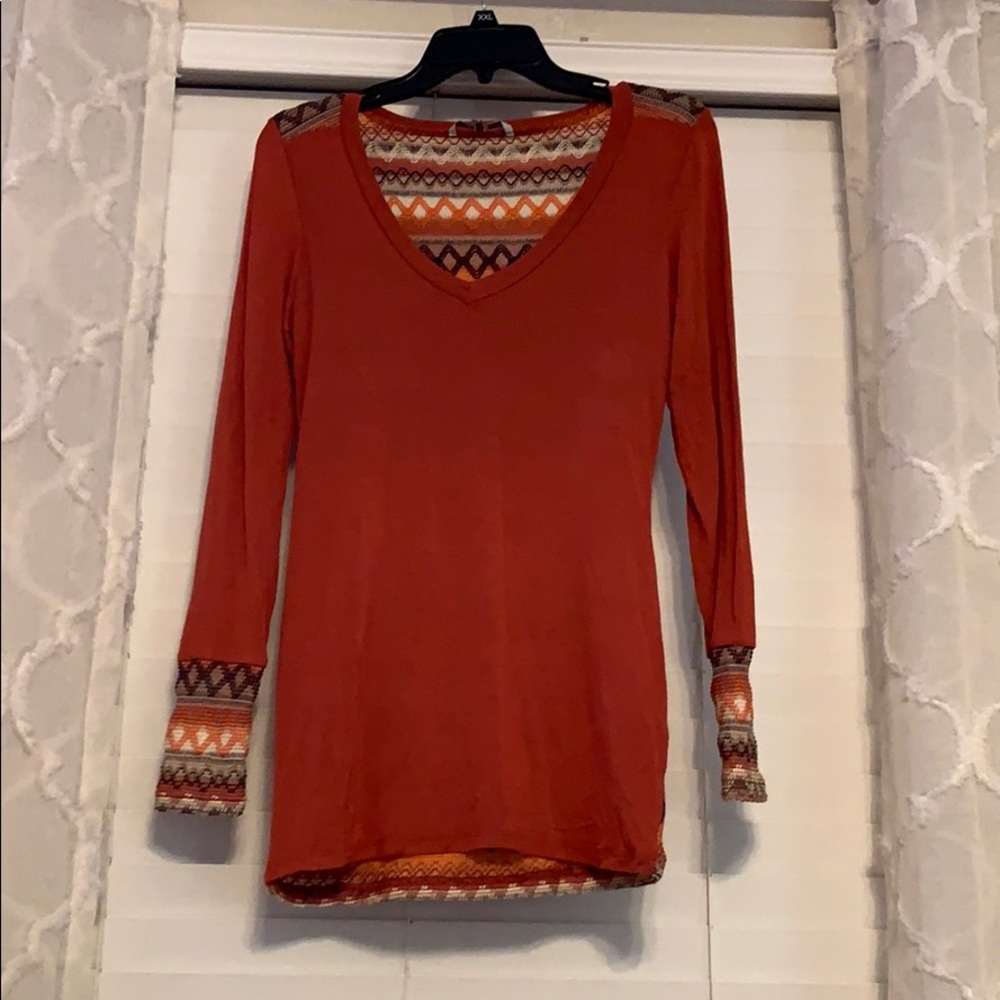 Orange long sleeve top